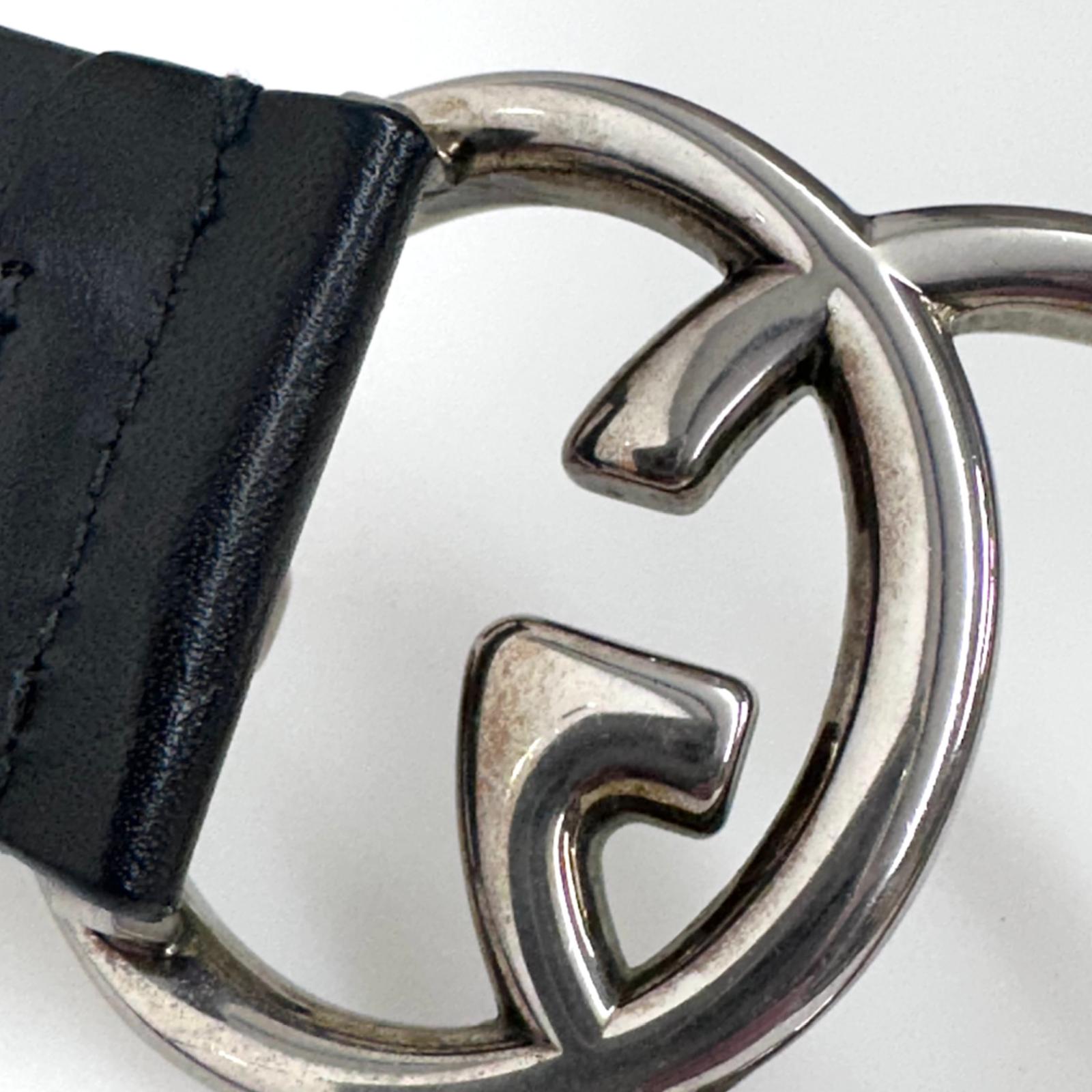 Gucci Cintura GG Marmont in pelle nera con fibbia doppia G argento