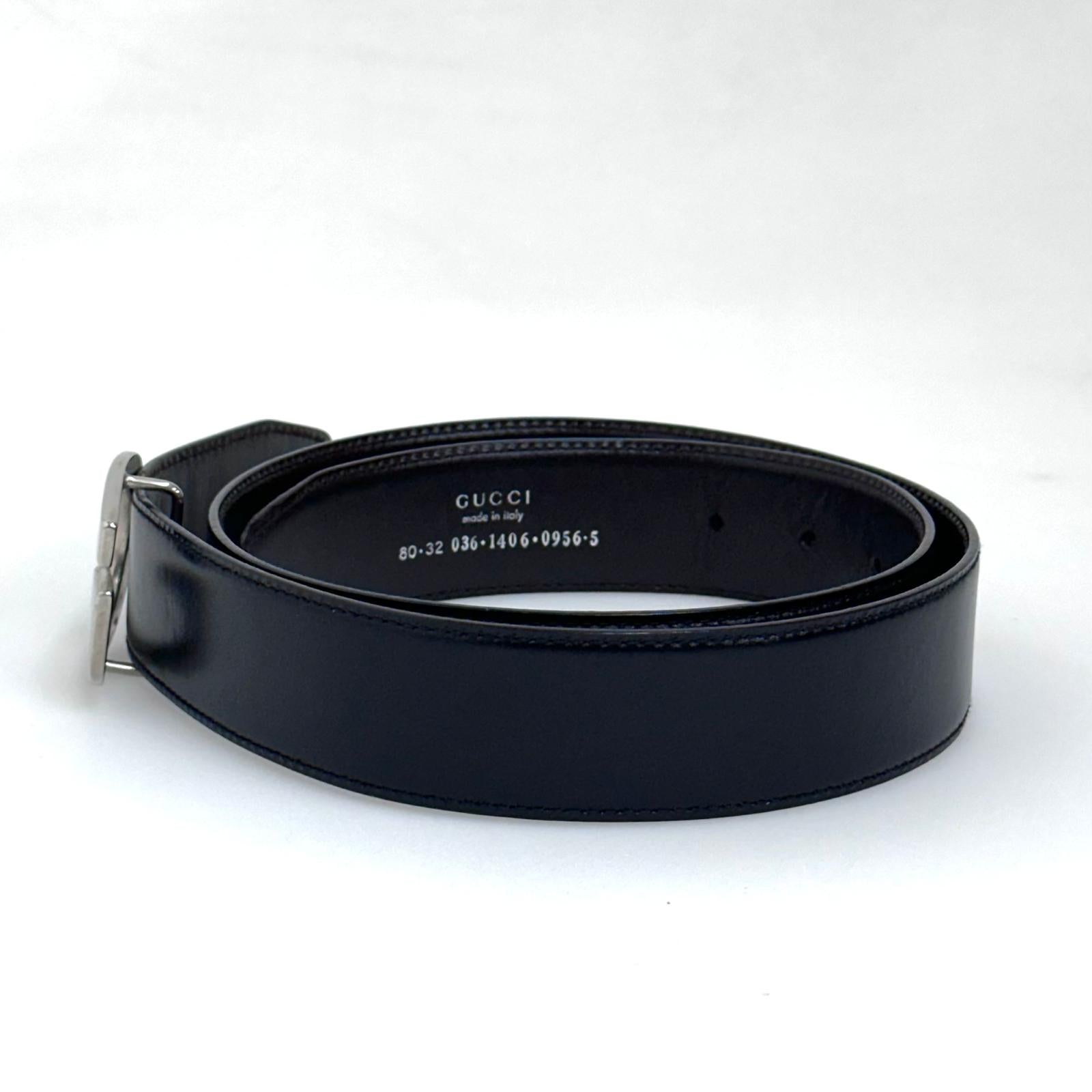 Gucci Cintura in pelle reversibile nera/marrone con fibbia G argento Mis. 80