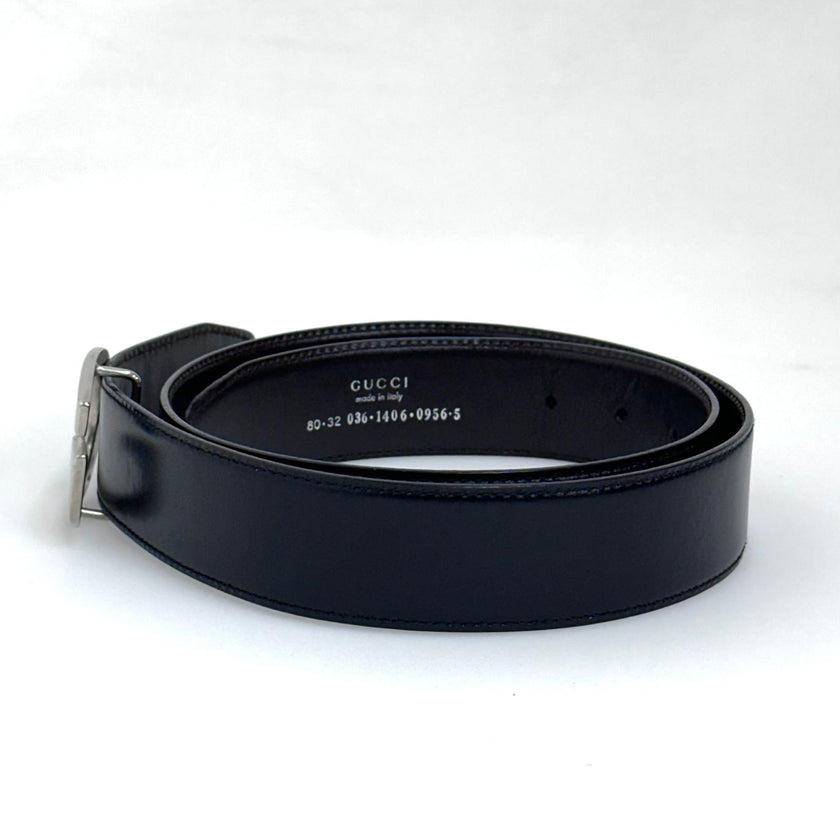 Gucci Cintura in pelle reversibile nera/marrone con fibbia G argento Mis. 80