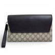 Gucci Clutch a mano GG Supreme con laccetto in pelle testa di moro