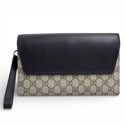 Gucci Clutch a mano GG Supreme con laccetto in pelle testa di moro