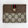 Gucci Portafoglio in tela GG Supreme e pelle marrone con chiusura Web