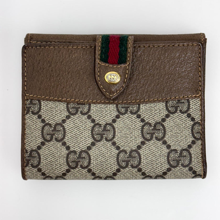 Gucci Portafoglio in tela GG Supreme e pelle marrone con chiusura Web