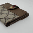 Gucci Portafoglio in tela GG Supreme e pelle marrone con chiusura Web