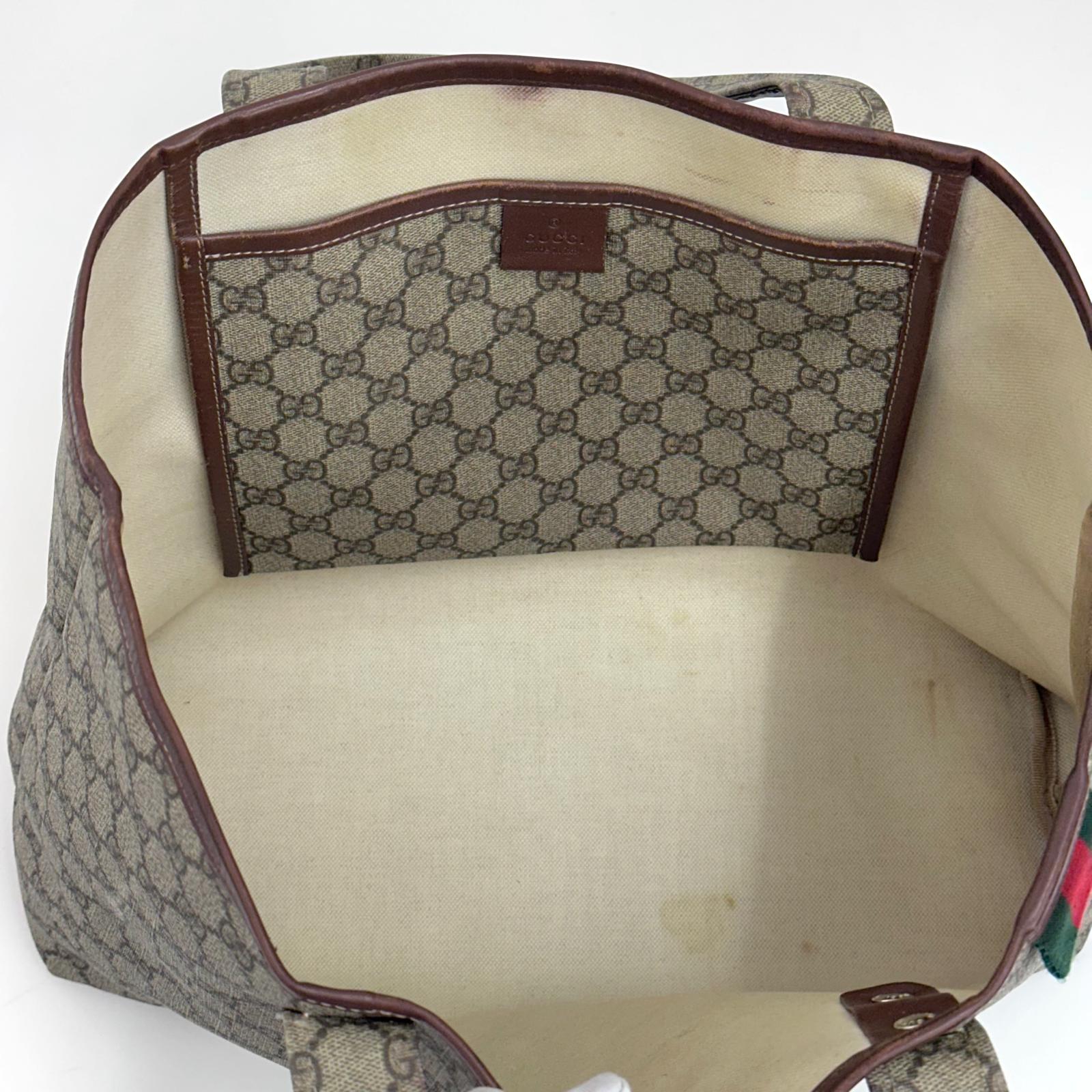 Gucci borsa shopping tote GG Supreme con Web stripe