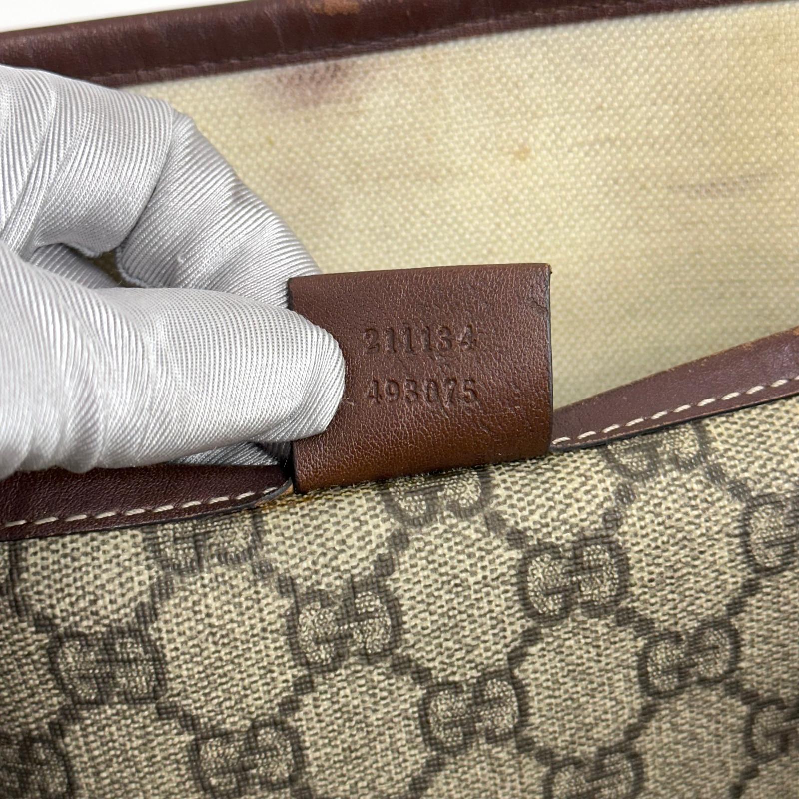 Gucci borsa shopping tote GG Supreme con Web stripe