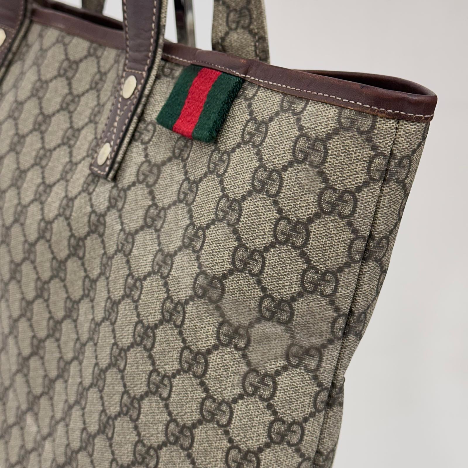 Gucci borsa shopping tote GG Supreme con Web stripe