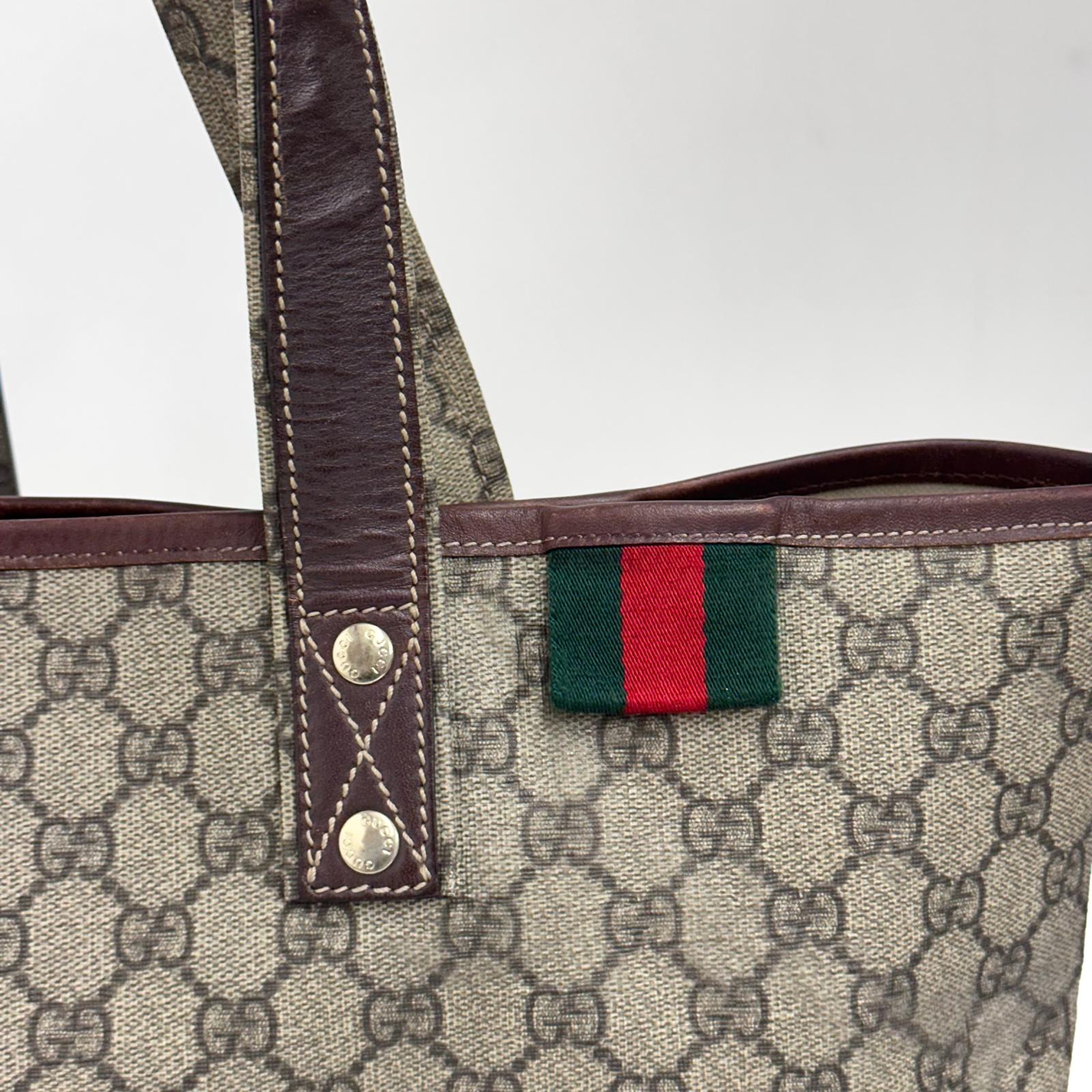 Gucci borsa shopping tote GG Supreme con Web stripe