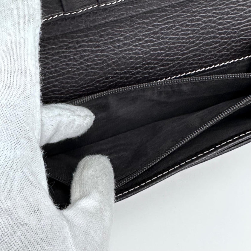 Gucci portafoglio donna Crystal in tela GG Supreme e pelle marrone