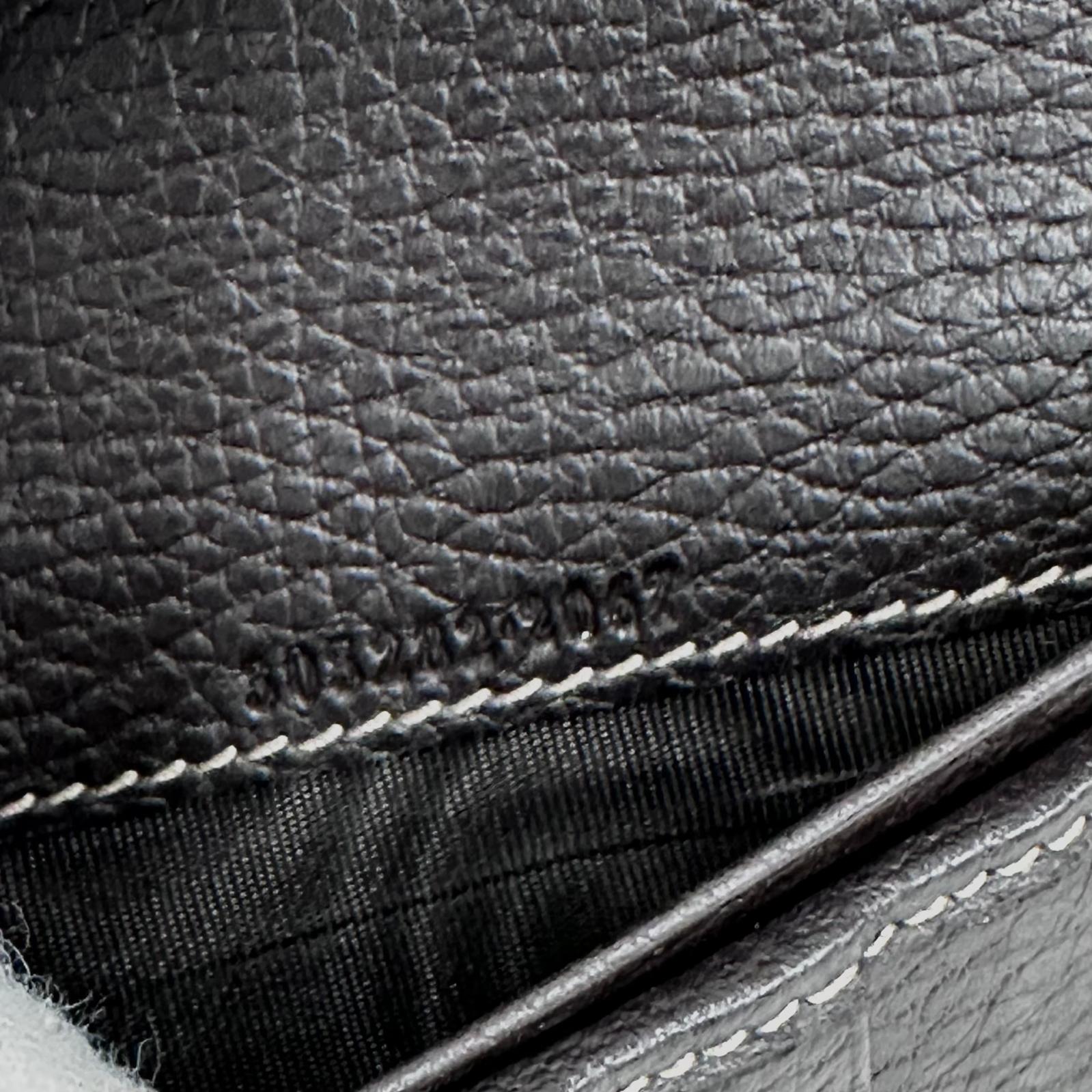 Gucci portafoglio donna Crystal in tela GG Supreme e pelle marrone