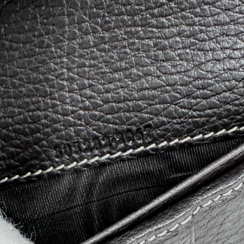 Gucci portafoglio donna Crystal in tela GG Supreme e pelle marrone