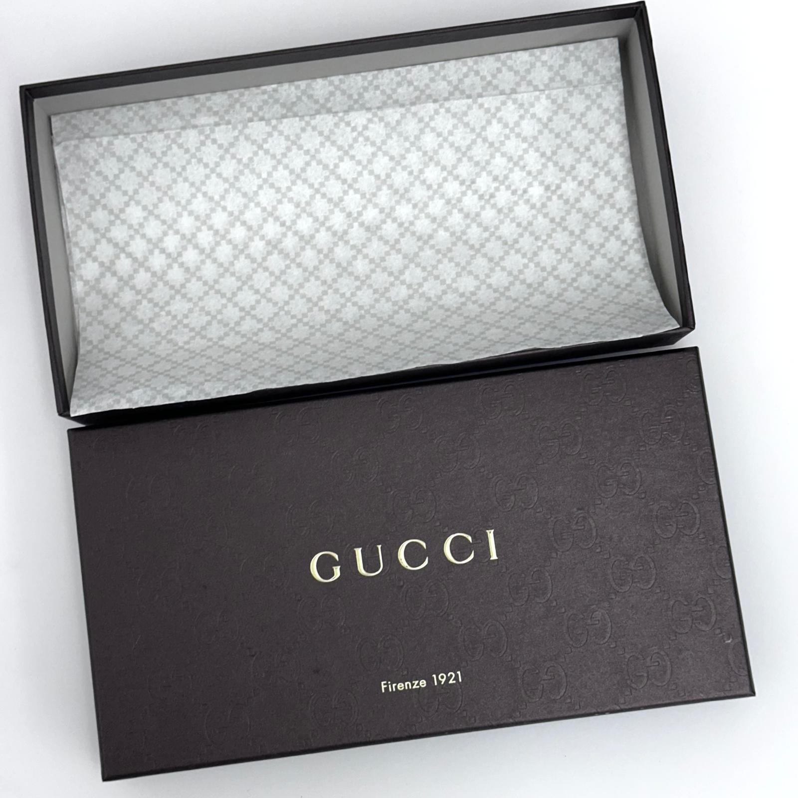Gucci portafoglio donna Crystal in tela GG Supreme e pelle marrone