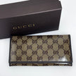 Gucci portafoglio donna Crystal in tela GG Supreme e pelle marrone