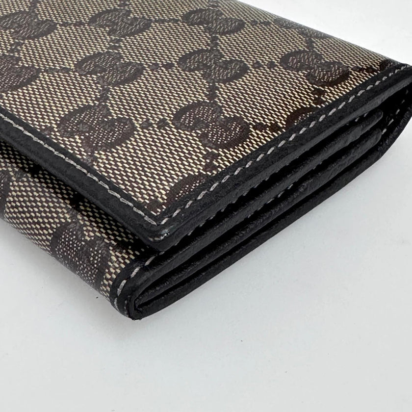 Gucci portafoglio donna Crystal in tela GG Supreme e pelle marrone