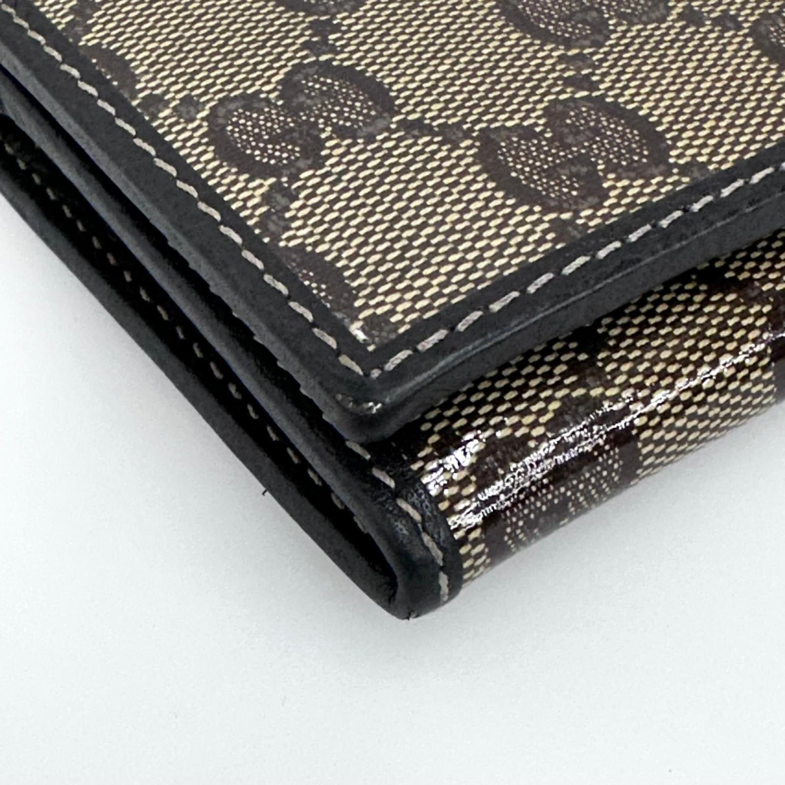 Gucci portafoglio donna Crystal in tela GG Supreme e pelle marrone