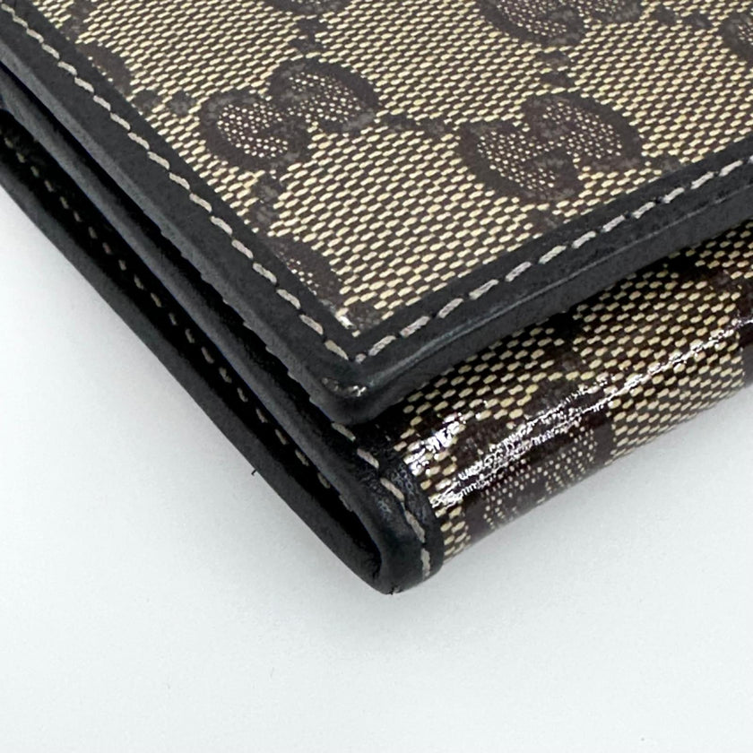 Gucci portafoglio donna Crystal in tela GG Supreme e pelle marrone