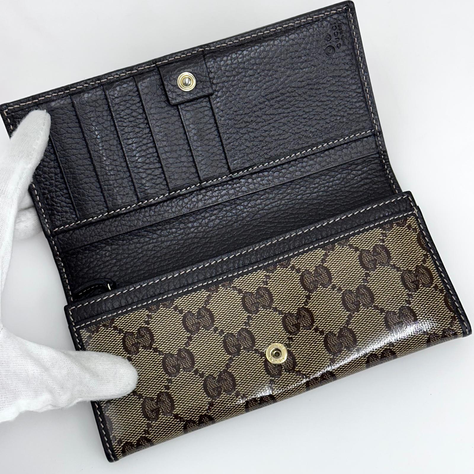 Gucci portafoglio donna Crystal in tela GG Supreme e pelle marrone