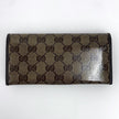 Gucci portafoglio donna Crystal in tela GG Supreme e pelle marrone