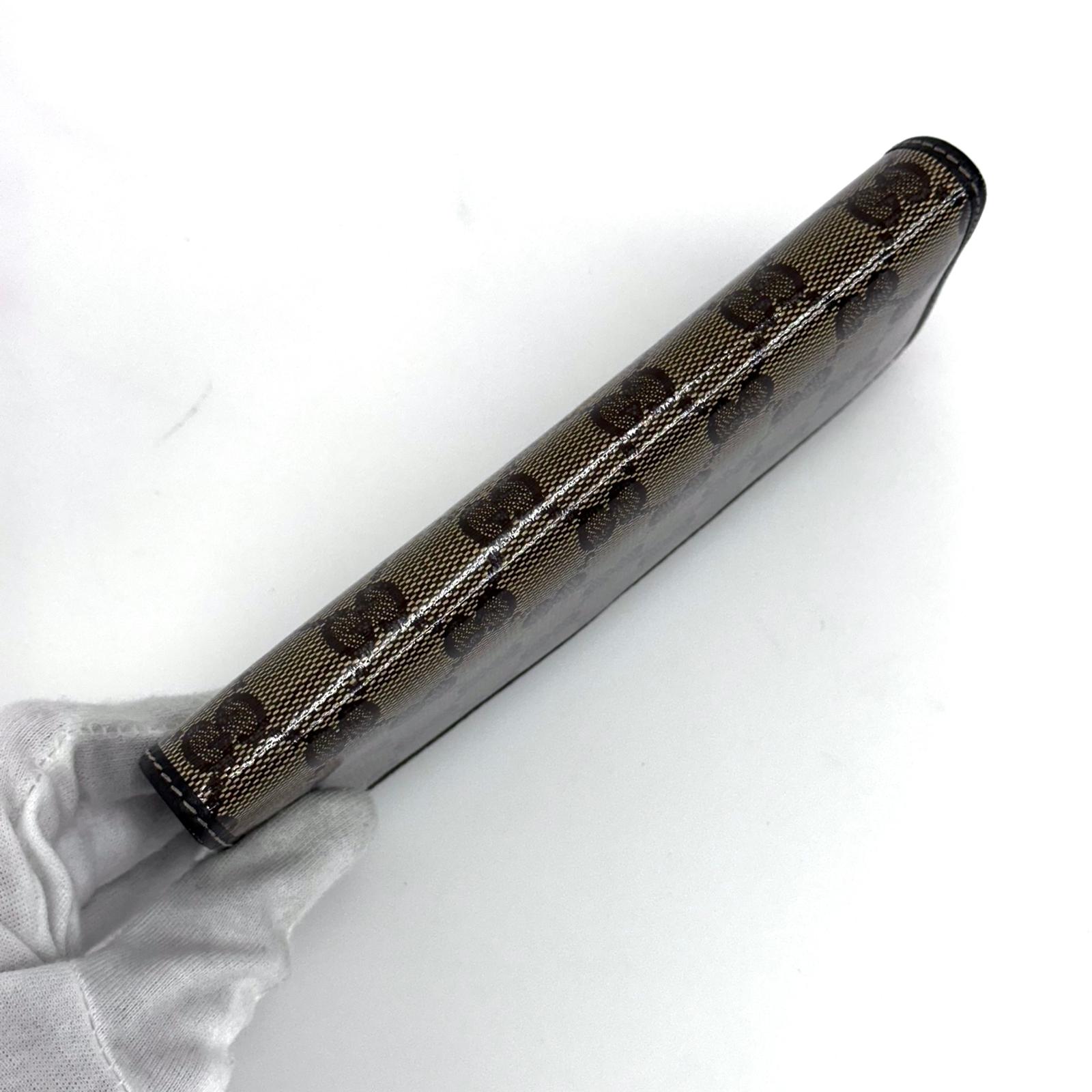 Gucci portafoglio donna Crystal in tela GG Supreme e pelle marrone