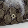 Gucci portafoglio donna Crystal in tela GG Supreme e pelle marrone