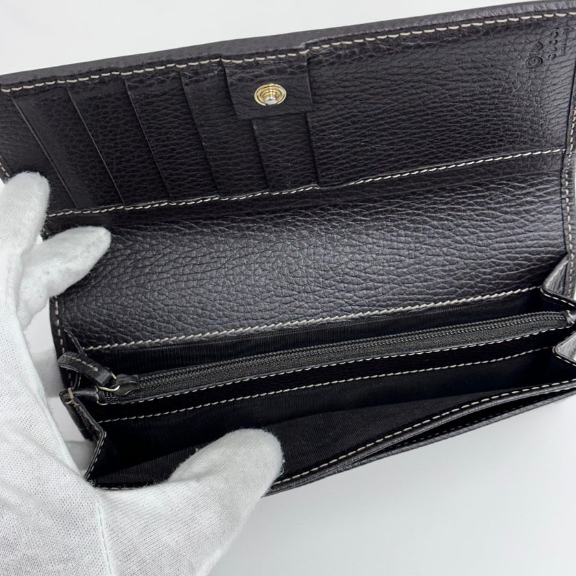 Gucci portafoglio donna Crystal in tela GG Supreme e pelle marrone