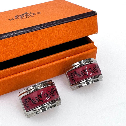 Hermès orecchini a clip in smalto rosso corallo con finiture metalliche