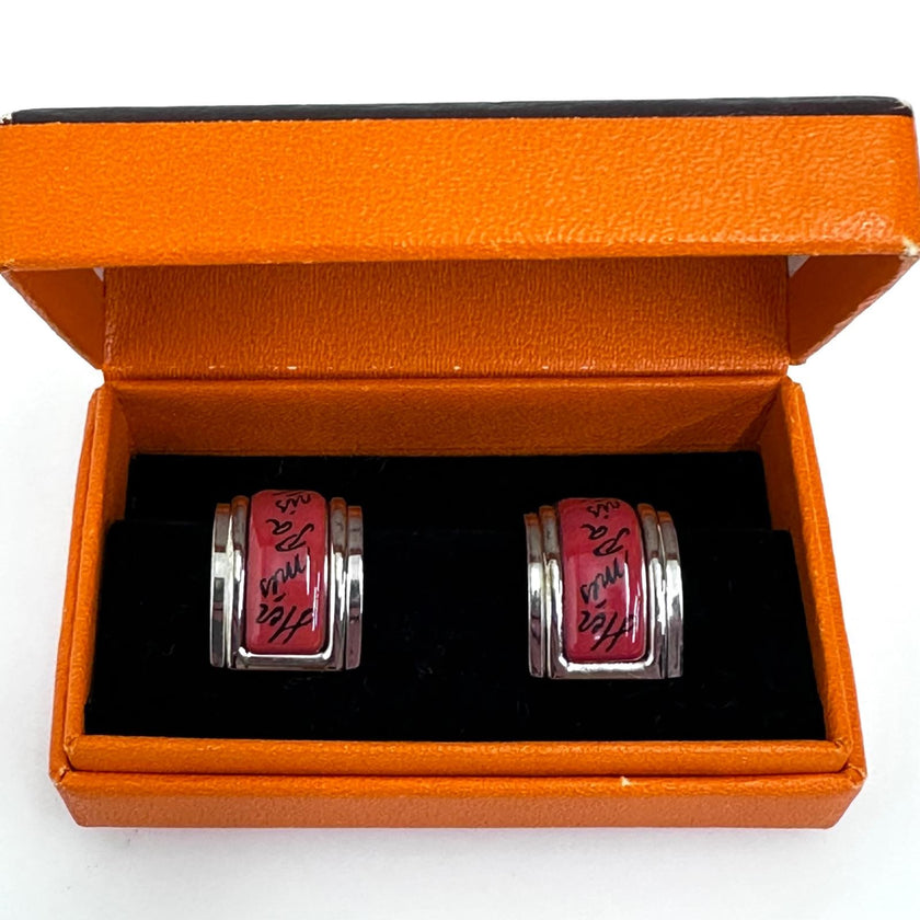 Hermès orecchini a clip in smalto rosso corallo con finiture metalliche