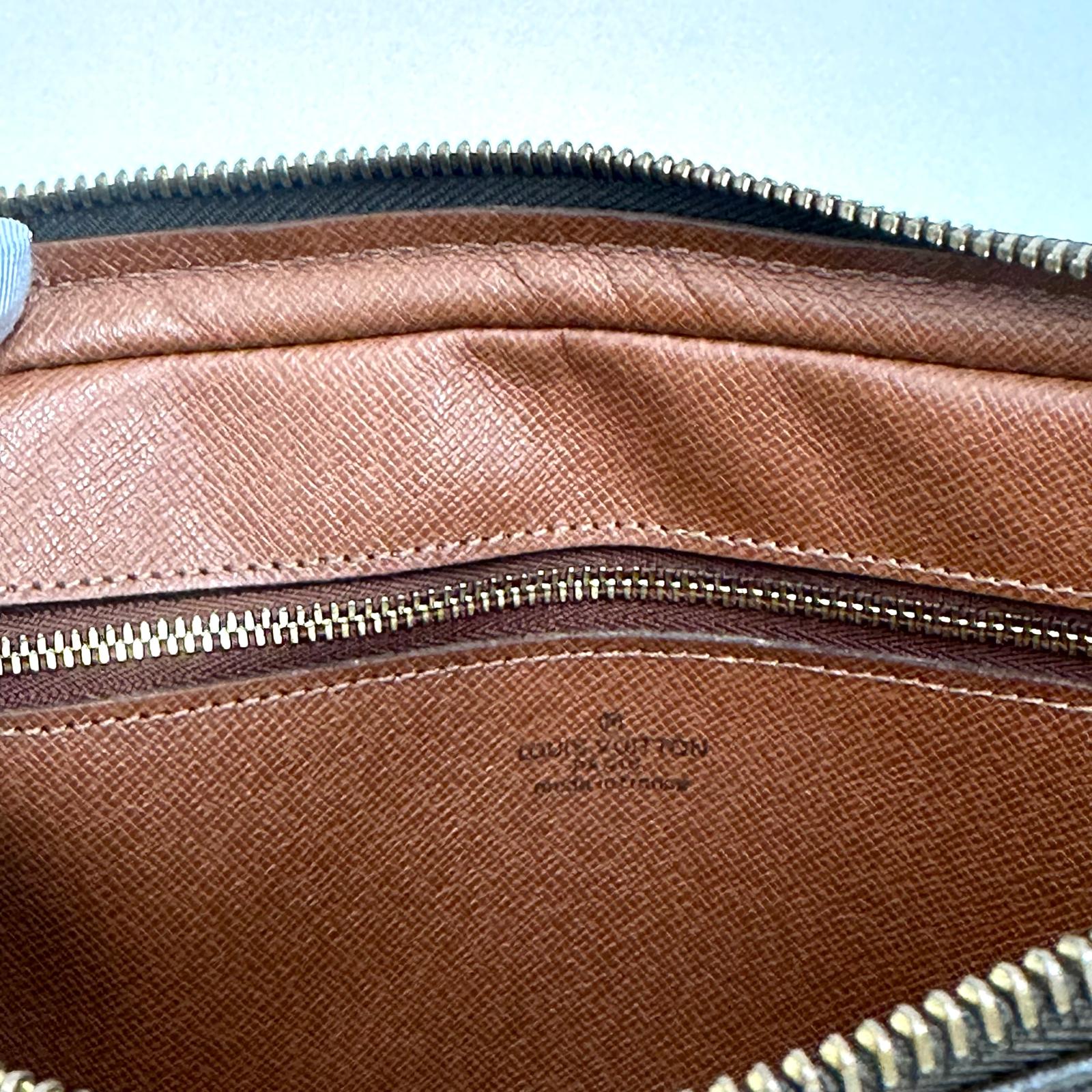 Louis Vuitton Clatch Marly Dragonne GM in tela Monogram