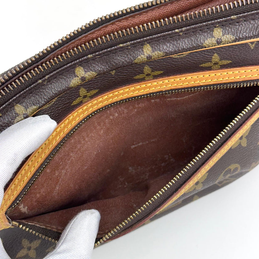 Louis Vuitton Clatch Marly Dragonne GM in tela Monogram