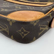 Louis Vuitton Clatch Marly Dragonne GM in tela Monogram
