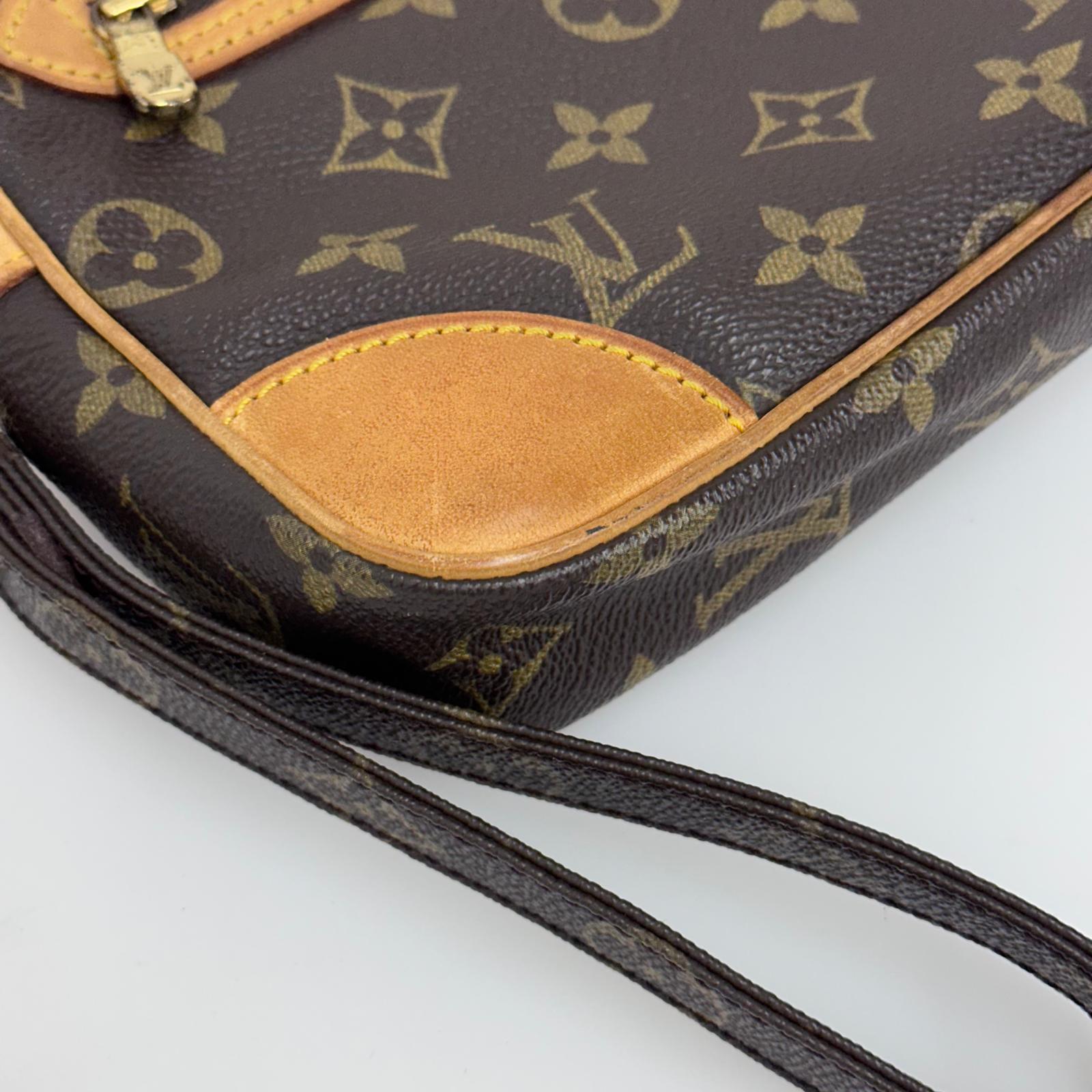 Louis Vuitton Clatch Marly Dragonne GM in tela Monogram