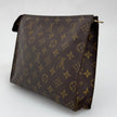 Louis Vuitton Pochette Trousse Toilette 26 in Tela Monogram