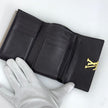 Louis Vuitton Portafoglio Capucines in pelle beige