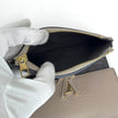 Louis Vuitton Portafoglio Capucines in pelle beige