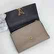 Louis Vuitton Portafoglio Capucines in pelle beige