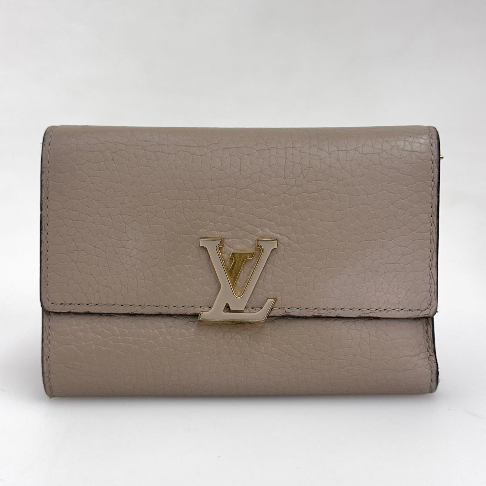 Louis Vuitton Portafoglio Capucines in pelle beige
