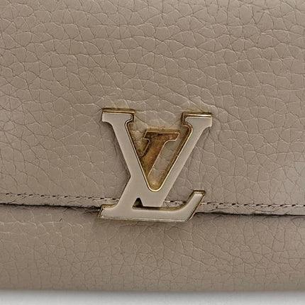 Louis Vuitton Portafoglio Capucines in pelle beige