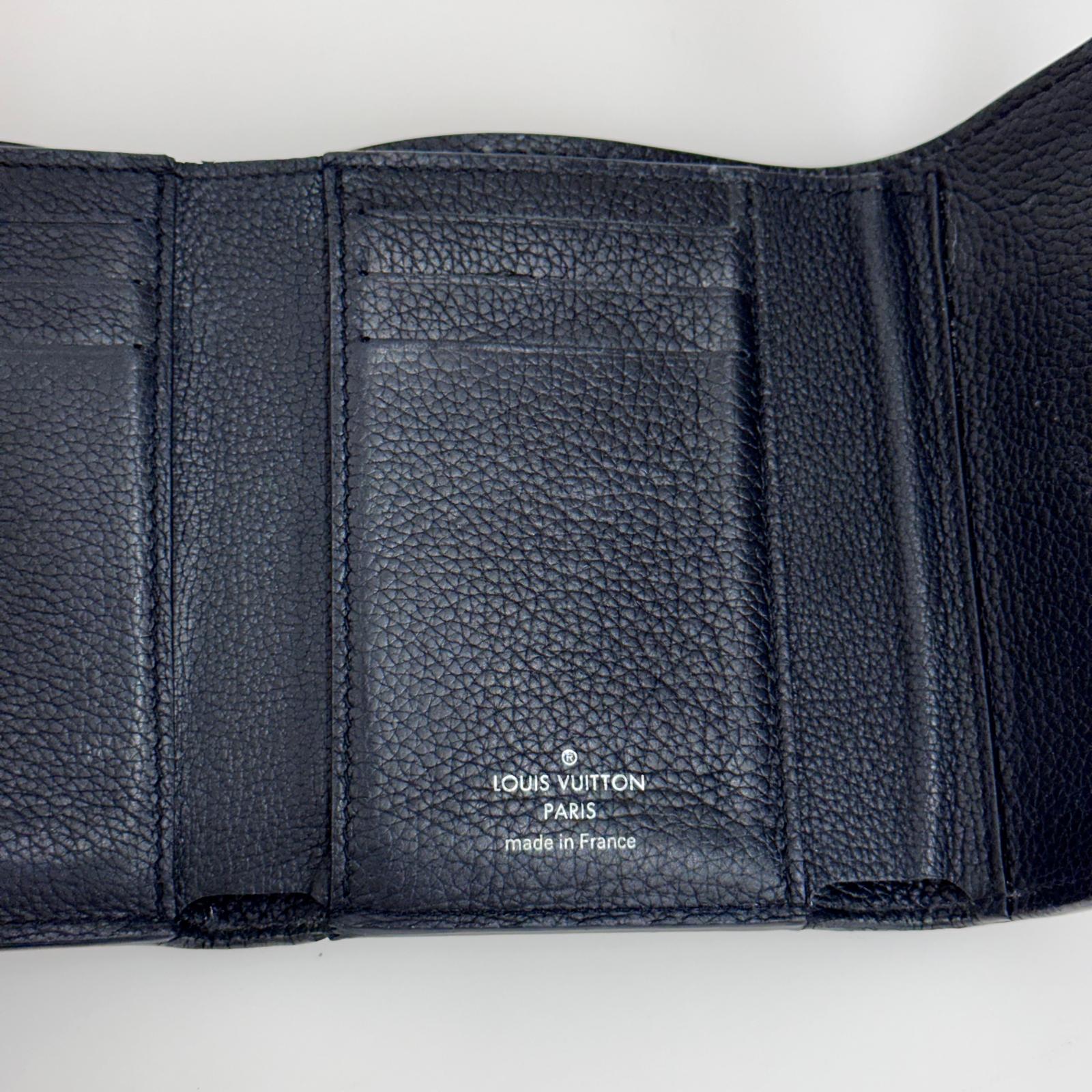 Louis Vuitton Portafoglio Lockme Compact in pelle nera