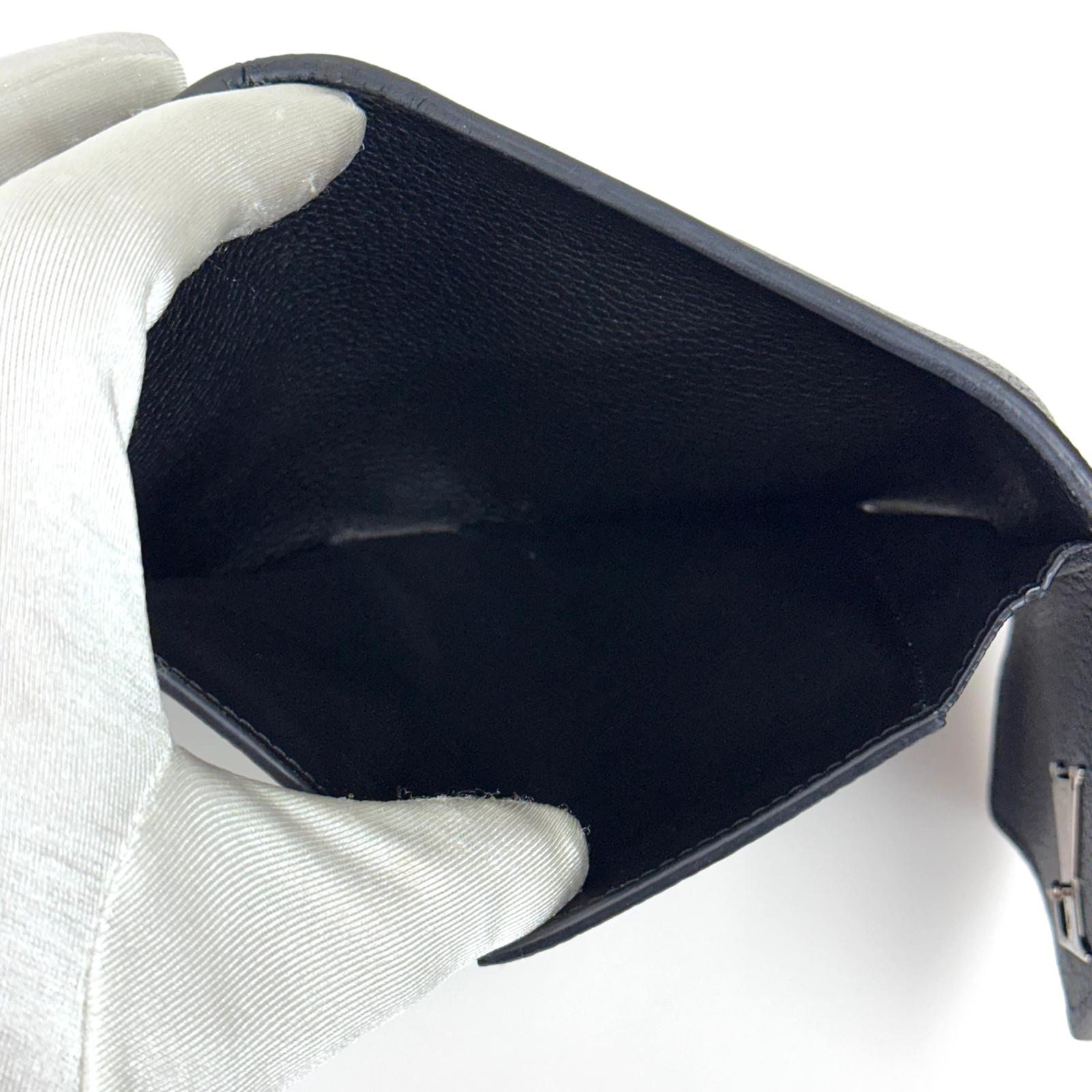 Louis Vuitton Portafoglio Lockme Compact in pelle nera