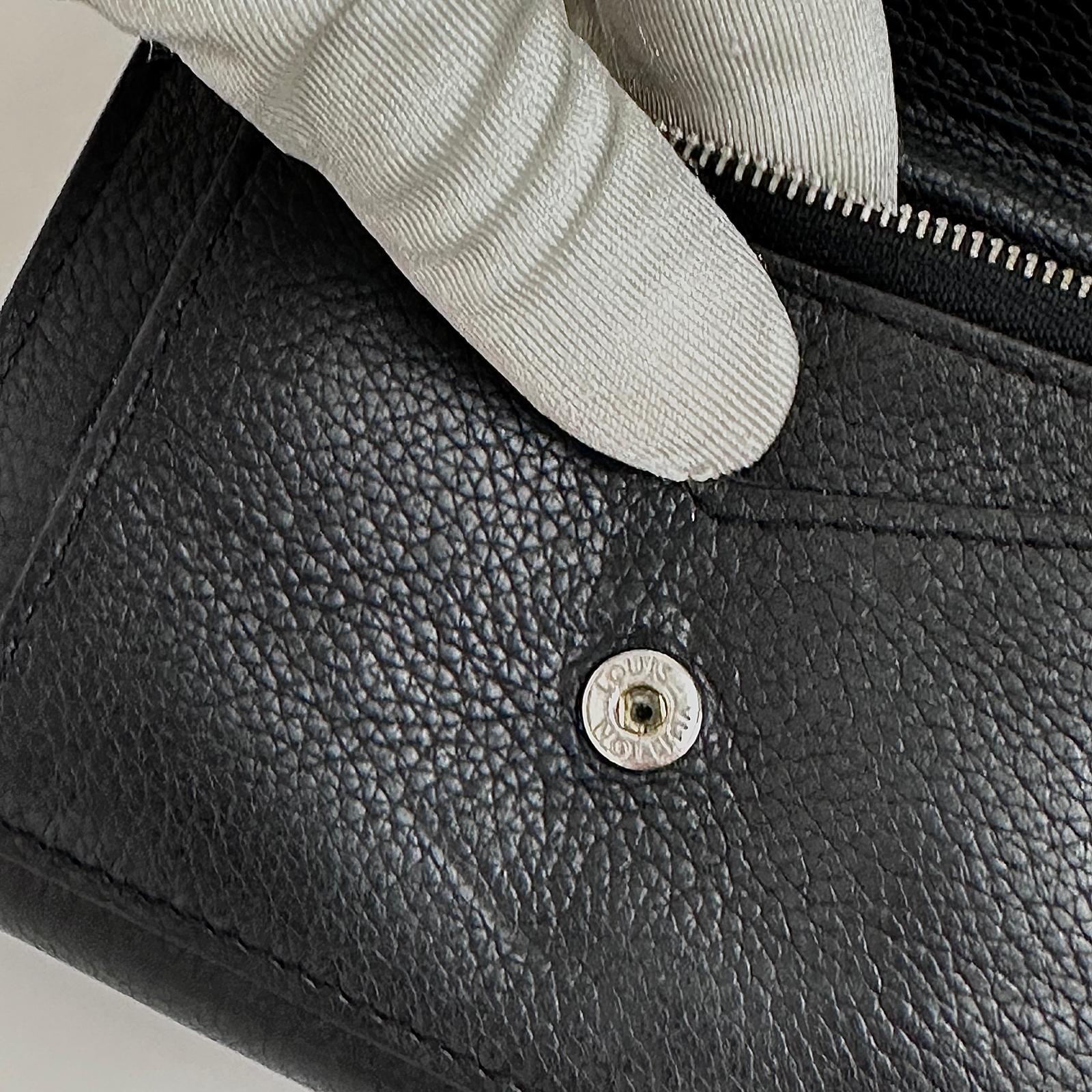 Louis Vuitton Portafoglio Lockme Compact in pelle nera