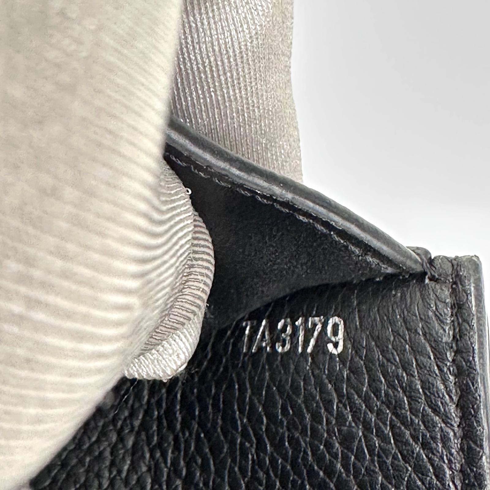Louis Vuitton Portafoglio Lockme Compact in pelle nera