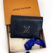 Louis Vuitton Portafoglio Lockme Compact in pelle nera