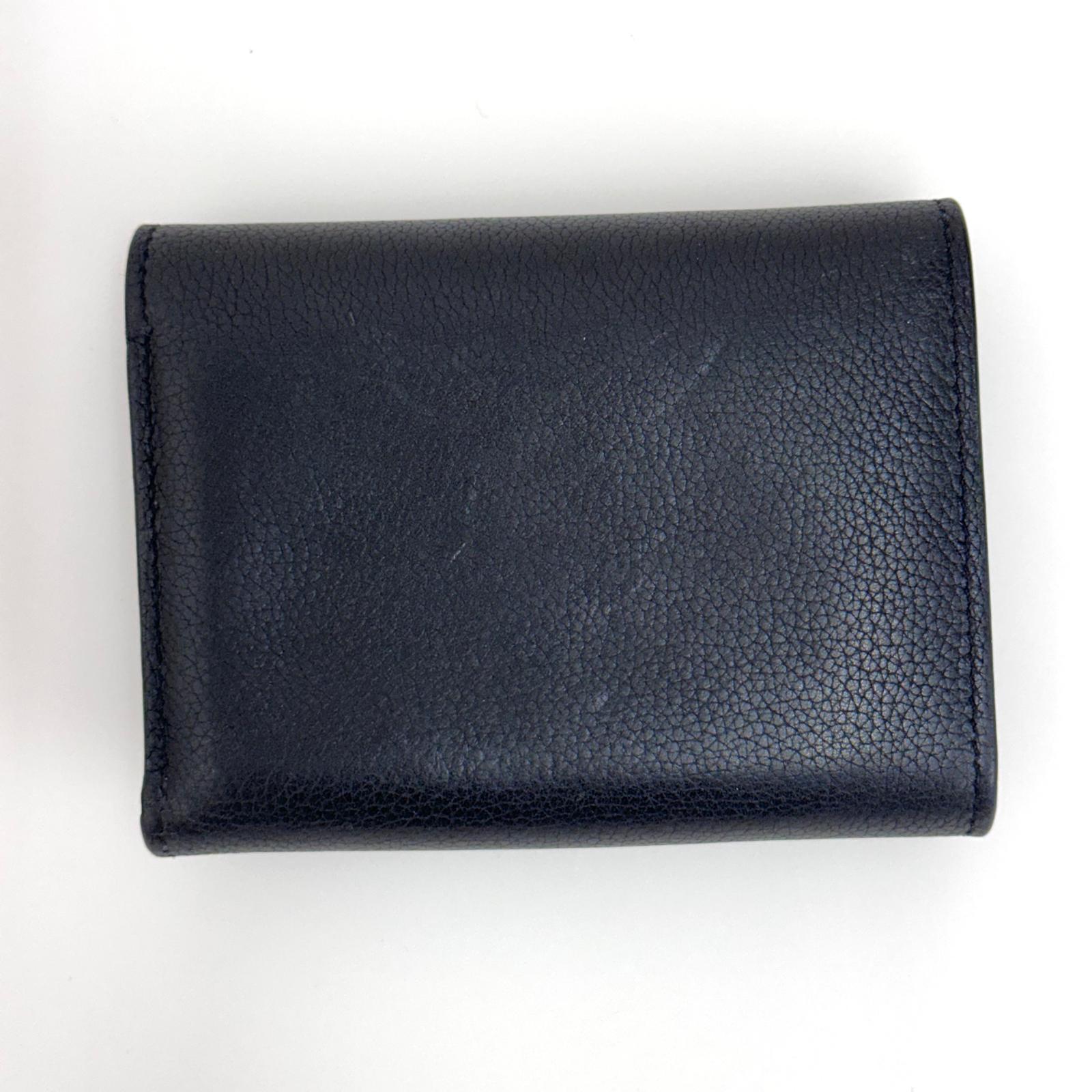 Louis Vuitton Portafoglio Lockme Compact in pelle nera