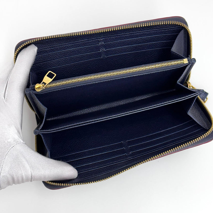 Louis Vuitton Portafoglio Zippy Wallet in Pelle Monogram Empreinte Blu
