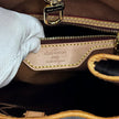 Louis Vuitton Batignolles Vertical in Tela Monogram