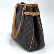 Louis Vuitton Batignolles Vertical in Tela Monogram
