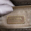 Prada Borsa a mano in pelle Saffiano traforata color cammello