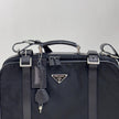 Prada Vintage Borsa da Viaggio in Nylon e Pelle Saffiano Nera