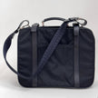 Prada Vintage Borsa da Viaggio in Nylon e Pelle Saffiano Nera