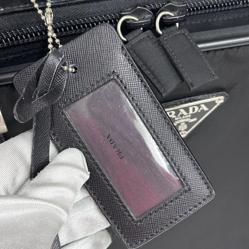 Prada Vintage Borsa da Viaggio in Nylon e Pelle Saffiano Nera